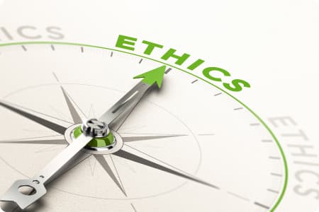A compass needle pointing towards Ethics