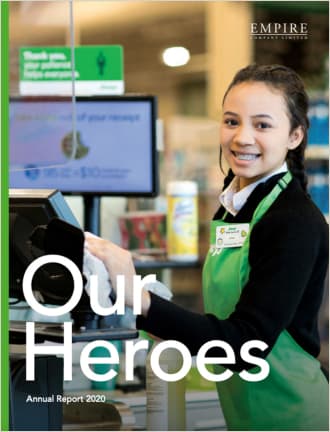 Text Reading 'Our Heroes Annual report 2020' with an image of a woman on the cash counter.